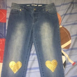 Girls glitter heart on knee jeggings jeans .